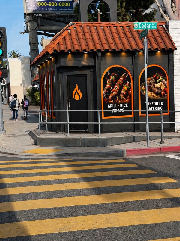 The Kabab House storefront with its Grill, Rice, Wraps and Takeout and Catering windows